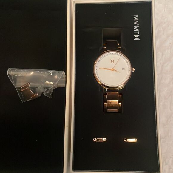 MVMT rose gold watch. Great condition. With extra links and box. - Picture 1 of 4